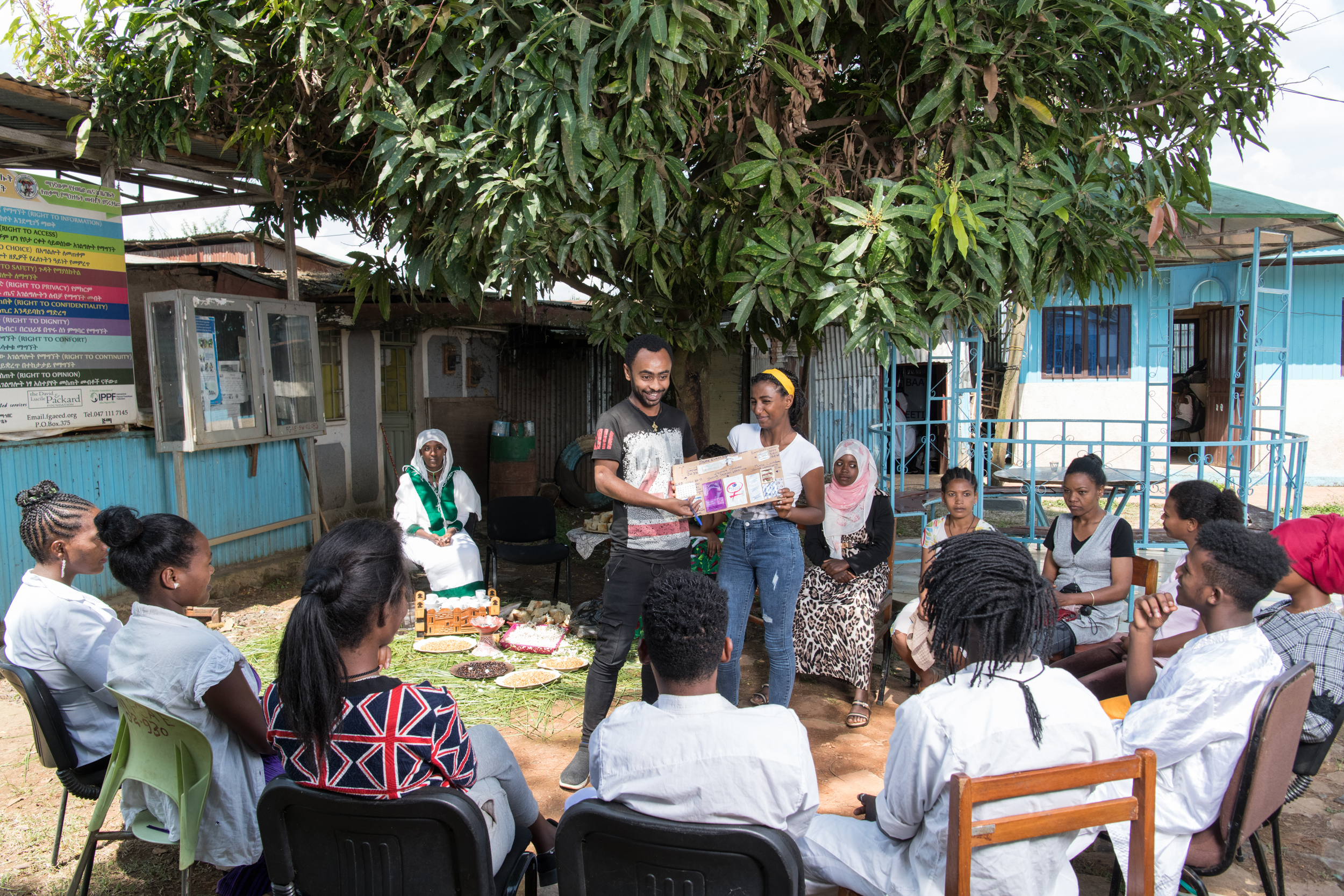Nebiyu (left) and Endegena (right) lead an Education for Health and Well-being session organized by the Family Guidance Association of Ethiopia (FGAE). FGAE offers sexual and reproductive health (SRH) services across the country, including in five zones of the Oromia Region. It has a network of 46 comprehensive SRH service delivery clinics and employs a youth-centered approach, which involves implementing services where adolescents and young people can easily access them, rather than directing clients to particular facilities.